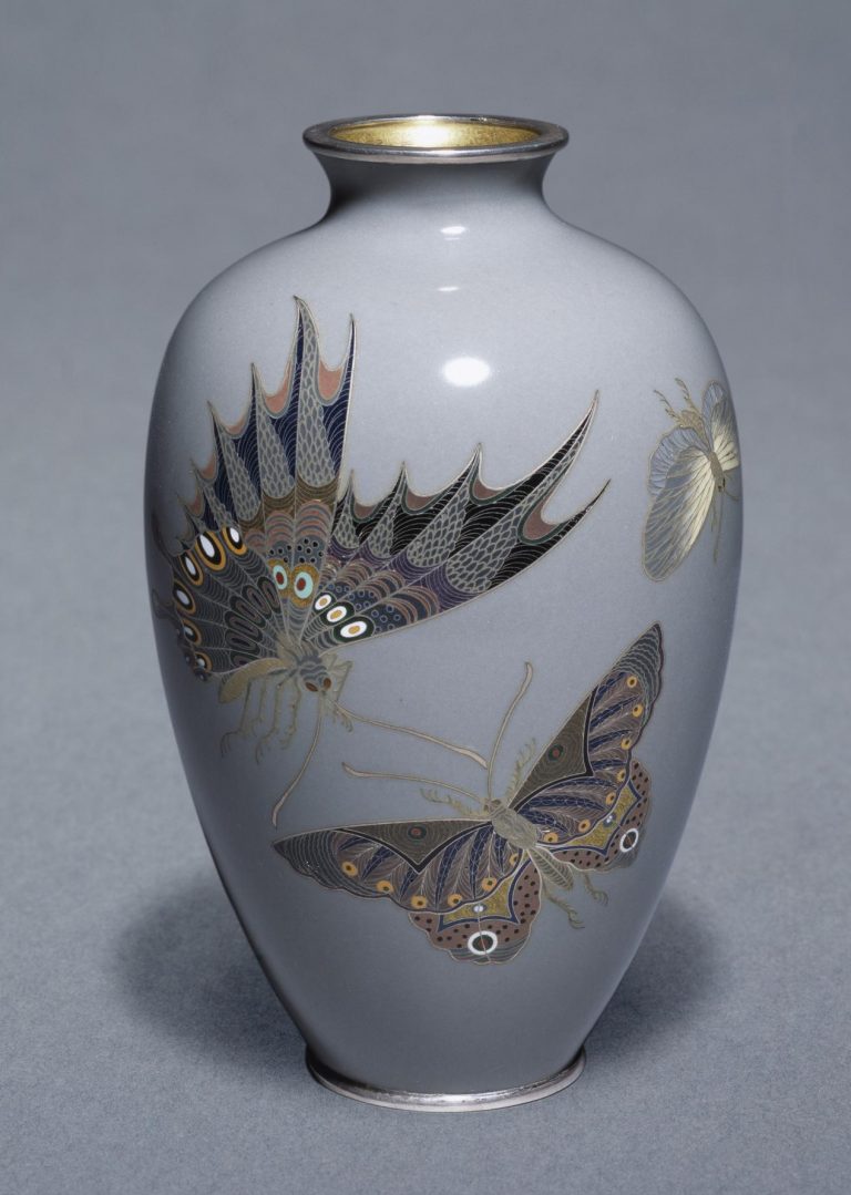 Cloisonne enamel vase decorated with butterflies.