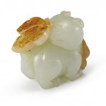 A WHITE AND RUSSET JADE 'CAT AND BUTTERFLY' GROUP QING DYNASTY, 19TH CENTURY