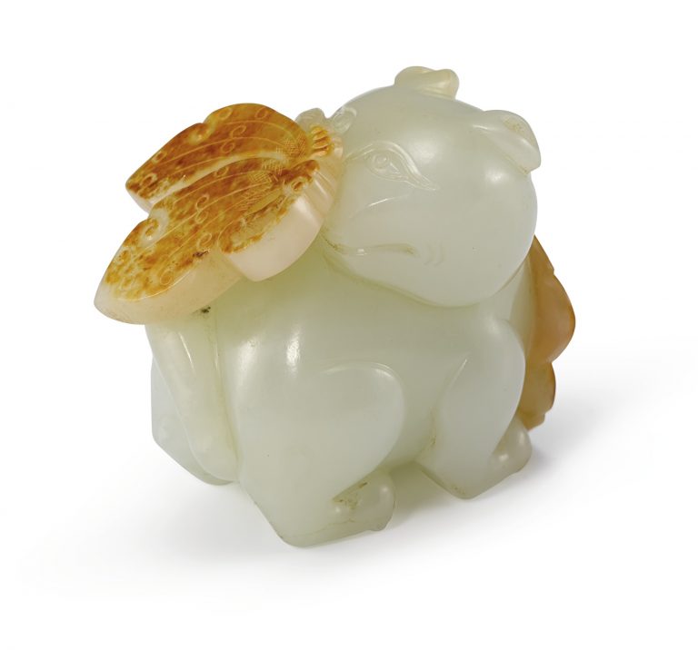 A WHITE AND RUSSET JADE 'CAT AND BUTTERFLY' GROUP QING DYNASTY, 19TH CENTURY