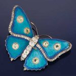 A LATE 19TH CENTURY DIAMOND, YELLOW SAPPHIRE AND ENAMEL BUTTERFLY BROOCH, BY CHILD & CHILD