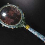 A CLOISONNE BUTTERFLY PAINTED LONG HANDLE MIRROR