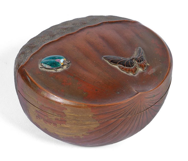 An enamel and copper 'chestnut' box and cover