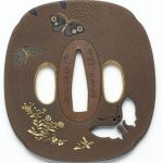 Hand-guard (tsuba) for a sword, copper inlaid with copper-gold alloy