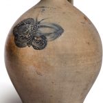 A COBALT-BLUE DECORATED SALT-GLAZED STONEWARE 'BUTTERFLY' TWO-GALLON JUG, L. NORTON & SON, BENNINGTON, VERMONT, 19TH CENTURY