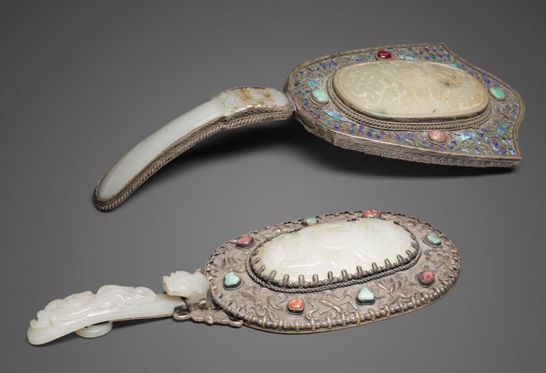 Two jade-mounted metal hand mirrors