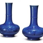A PAIR OF UNDERGLAZE-BLUE-DECORATED BLUE-GLAZED 'FLORAL' BOTTLE VASES QING DYNASTY, KANGXI PERIOD